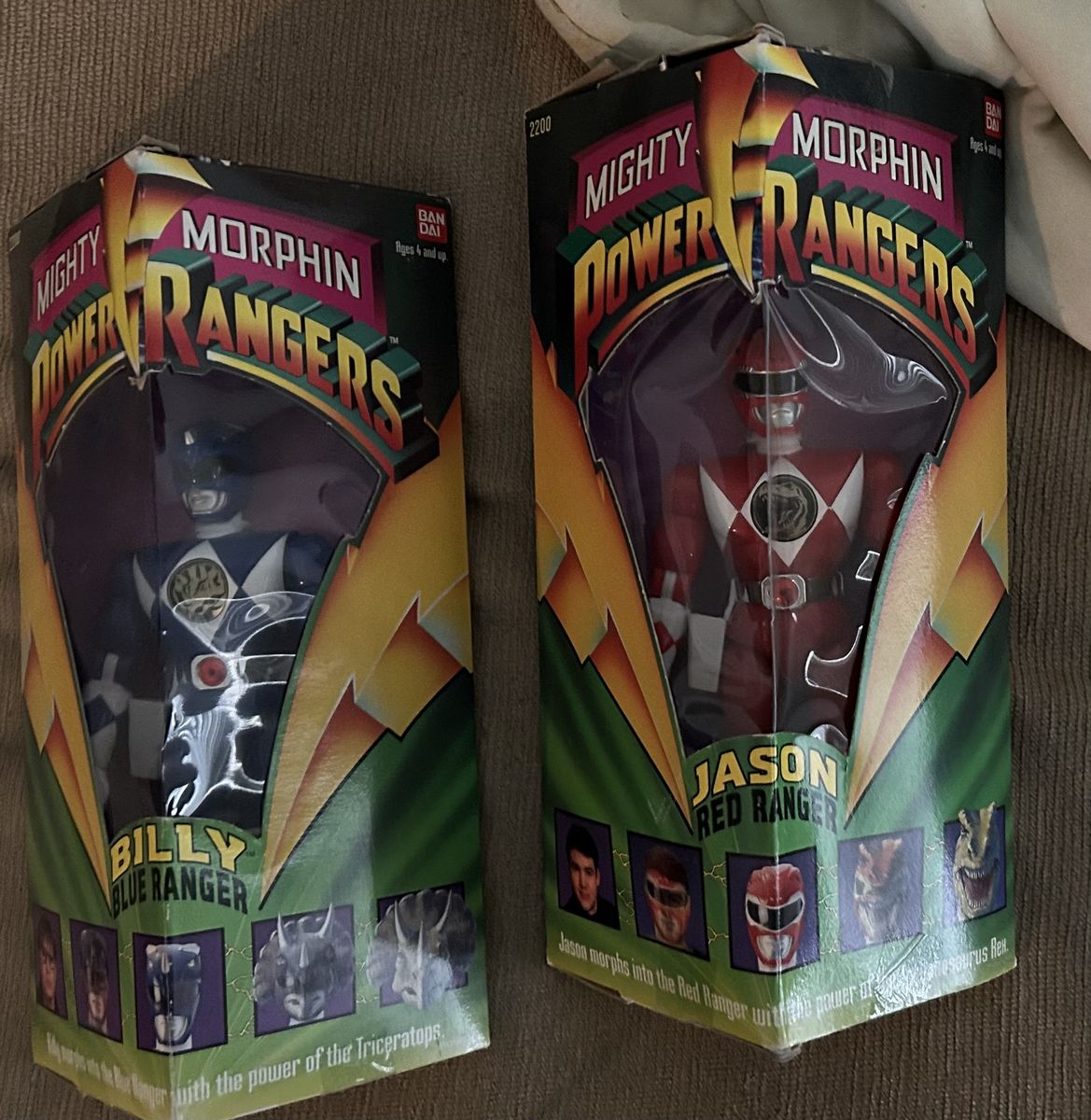 Red and blue power rangers dolls
