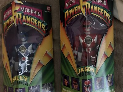 Red and blue power rangers dolls