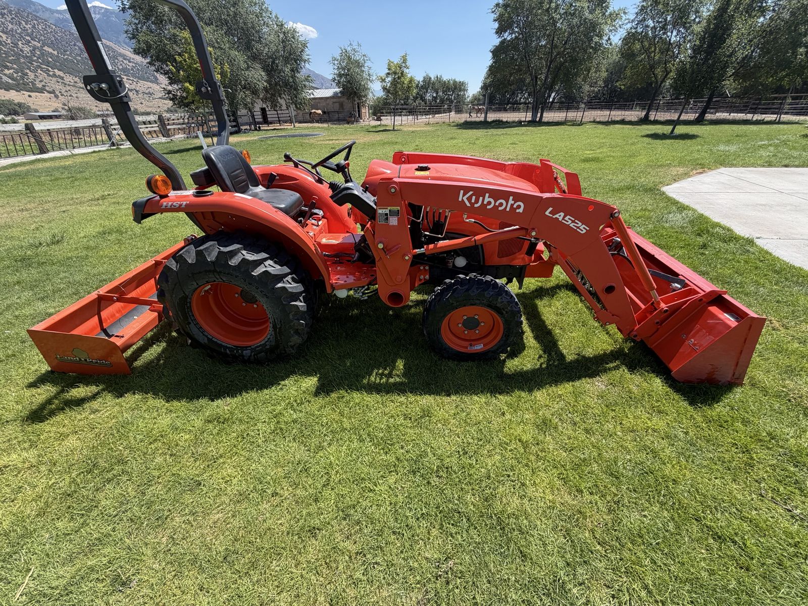 Kubota Tractor with LA525 Front Loader & Land Pride Box Blade Attachment