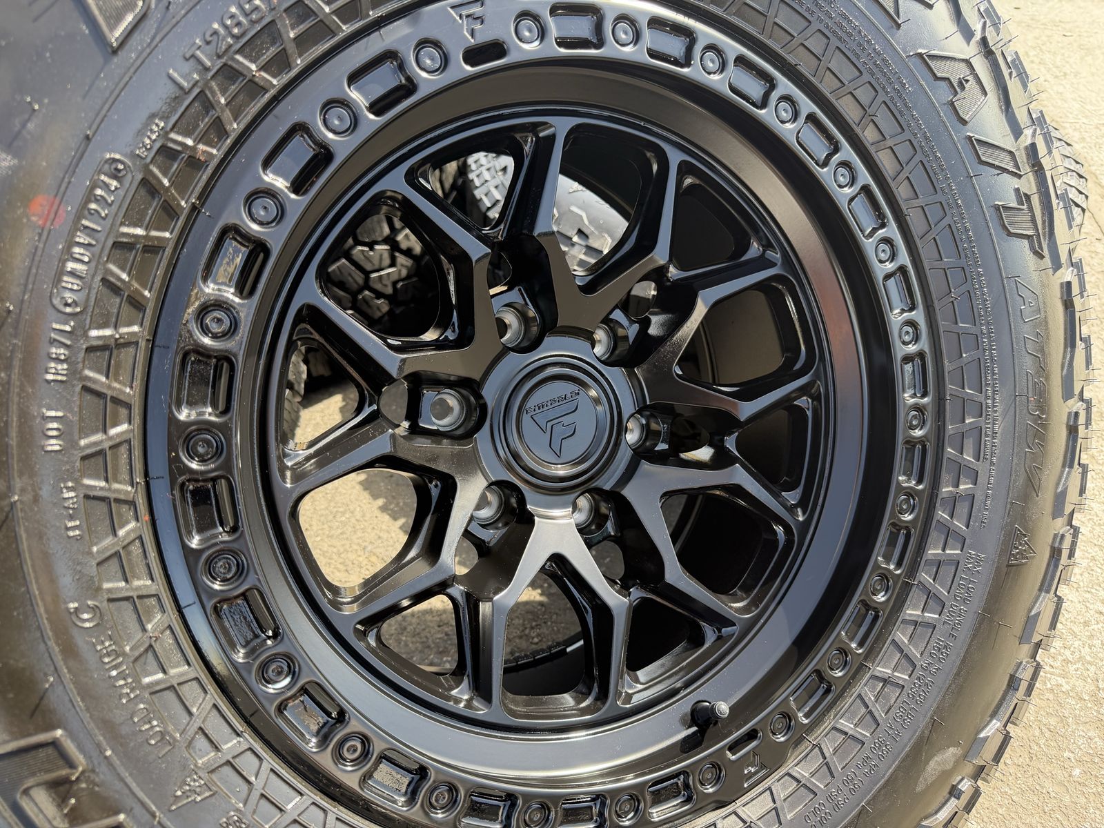 17" Fittipaldi 6 Lug 6x5.5 33 Falken At4 285/70R17