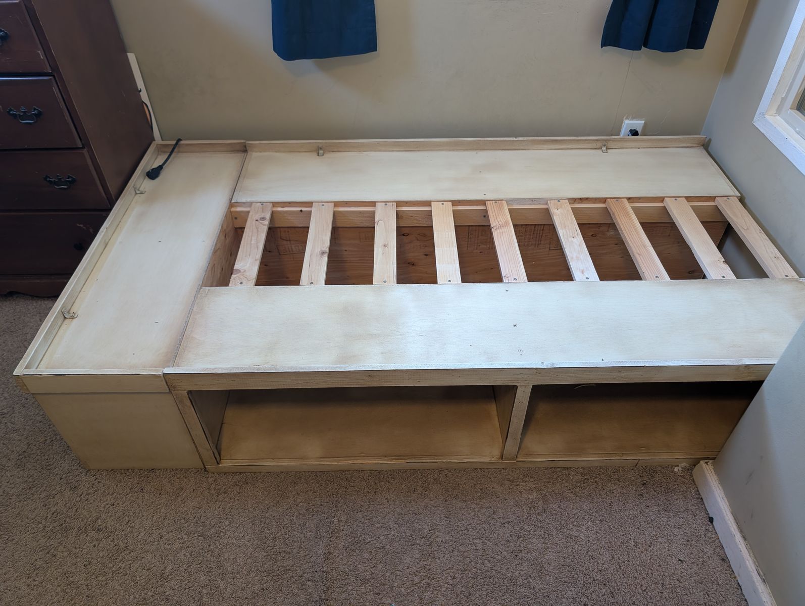 Custom wood bed frame with storage cubbies
