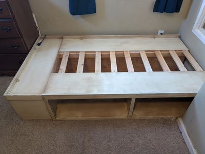 Custom wood bed frame with storage cubbies