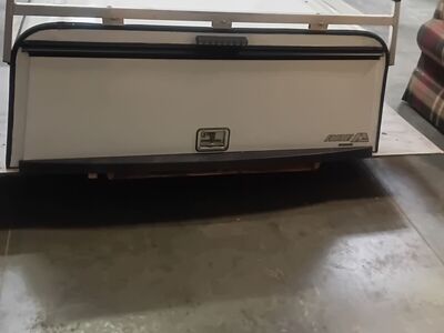 Fully functional canopy for a 2021 Ford F-150 with an 8' bed.