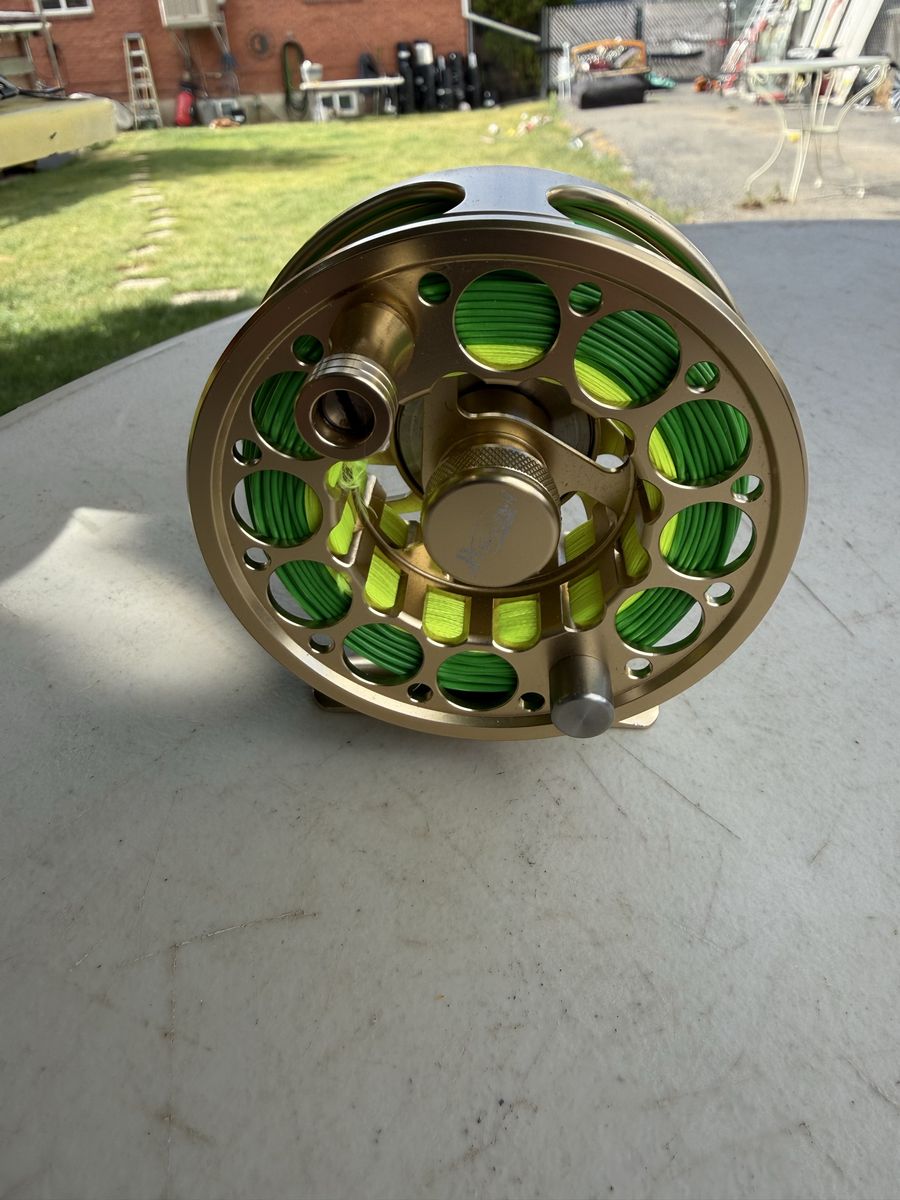 Large Fly Fishing Reel - Gold Tone with Bright Green Line - Excellent Condition