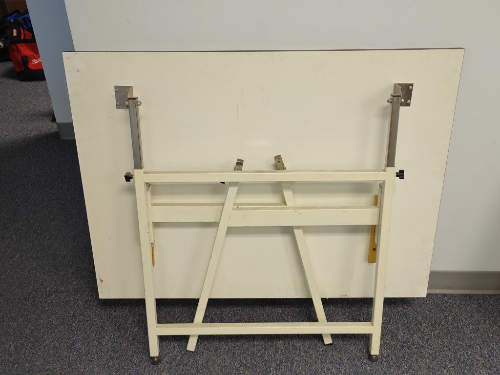 Folding draft table