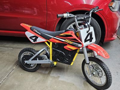 Razor MX650 with a red Mx500 new body just loved the look. NEW batteries and upgrade shock w charger lights and horn. FIRM $550