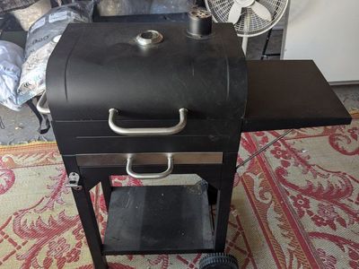 Portable charcoal grill