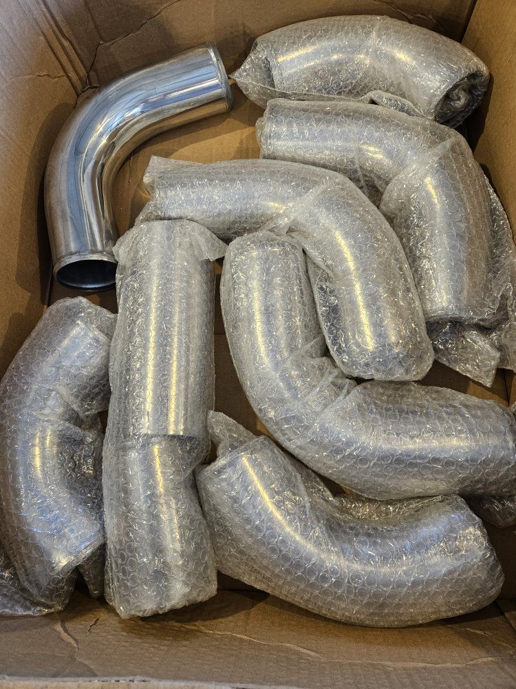 intercooler, aluminum pipes, silicone elbows, couple's and clamps