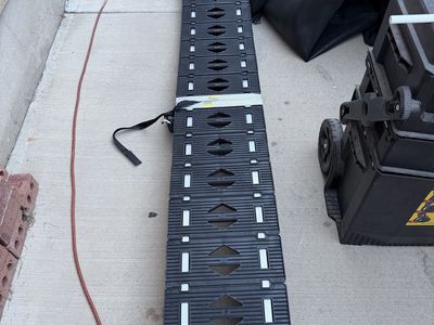 2 motorcycle, bike ramps for your truck or trailer. One of them is a Caliber ProTrax brand.