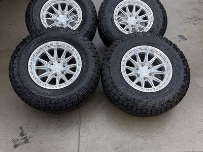 17x9 arena “atlas” machined 6x135/ 285/70/17 Nitto ridge graps