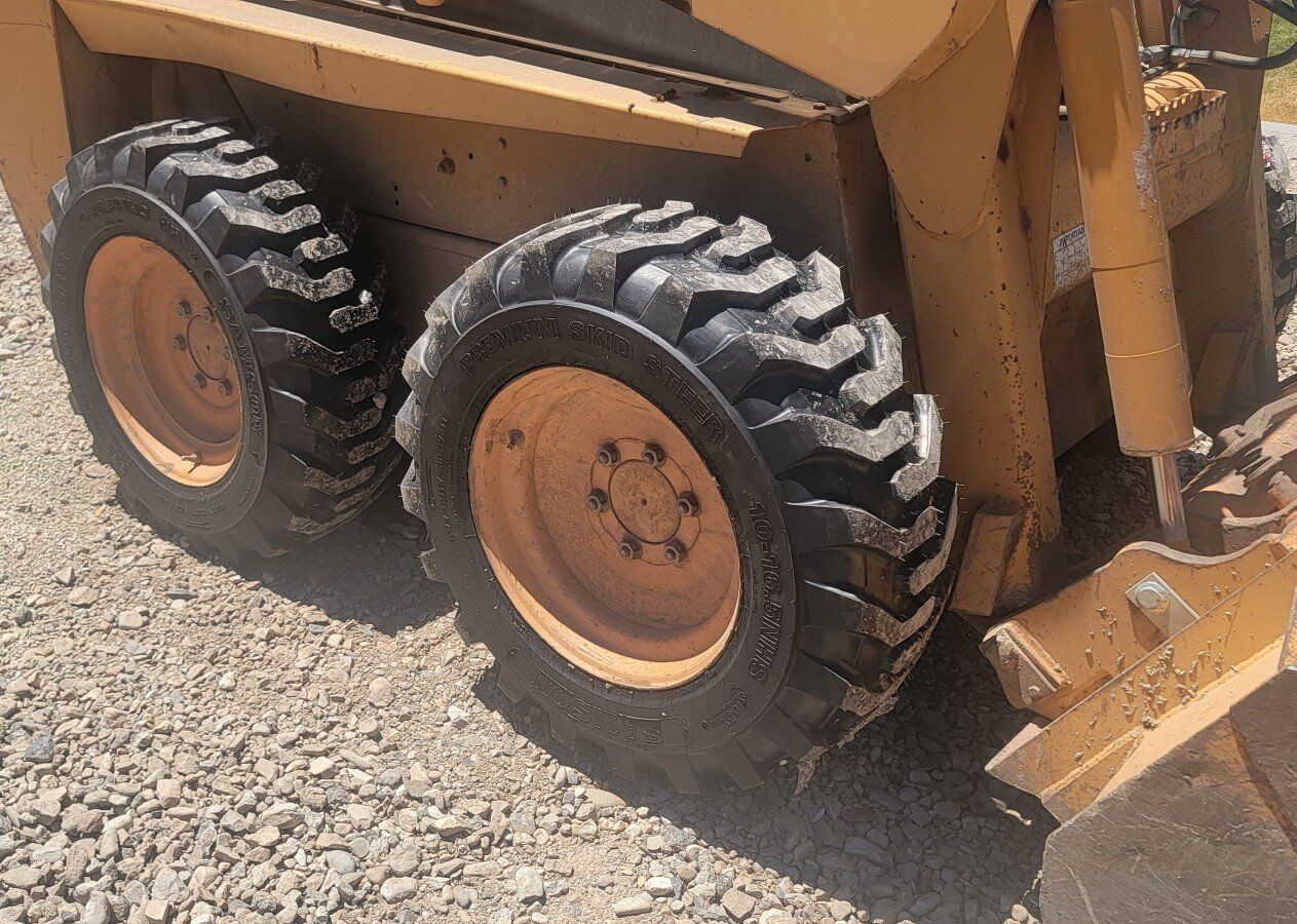 4 new skid steer tires