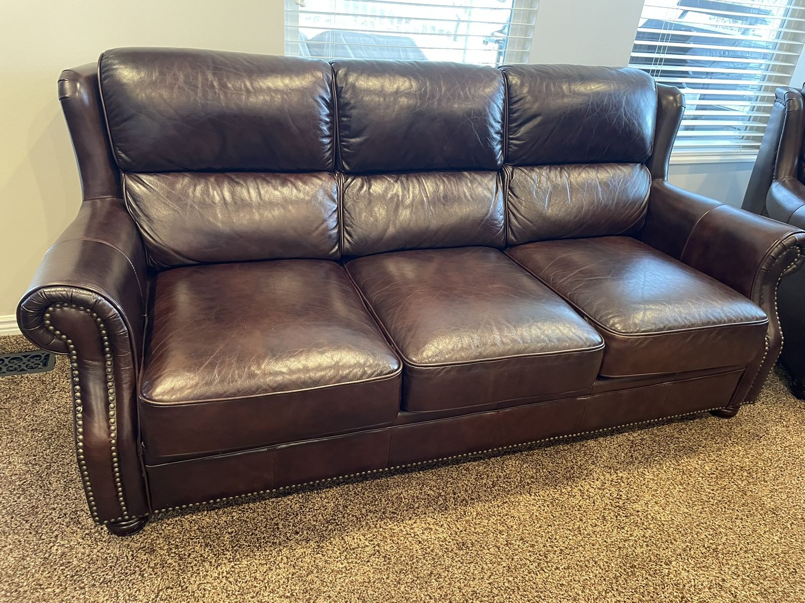 Beautiful, high-quality, dark brown Leather Couches and Matching Armchair