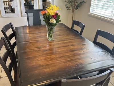 Table, 5 chairs and a leaf