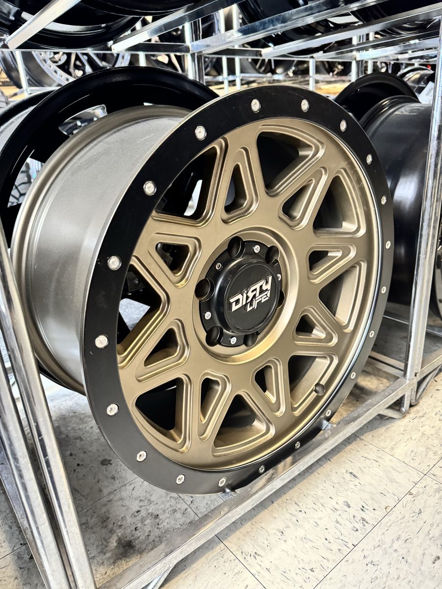 Dirty Life  18x9  matte gold w/ matte black lip lug pattern 6x139.7 brand new set of 4 wheels