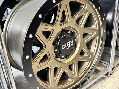 Dirty Life 18x9 matte gold w/ matte black lip lug pattern 6x139.7 brand new set of 4 wheels