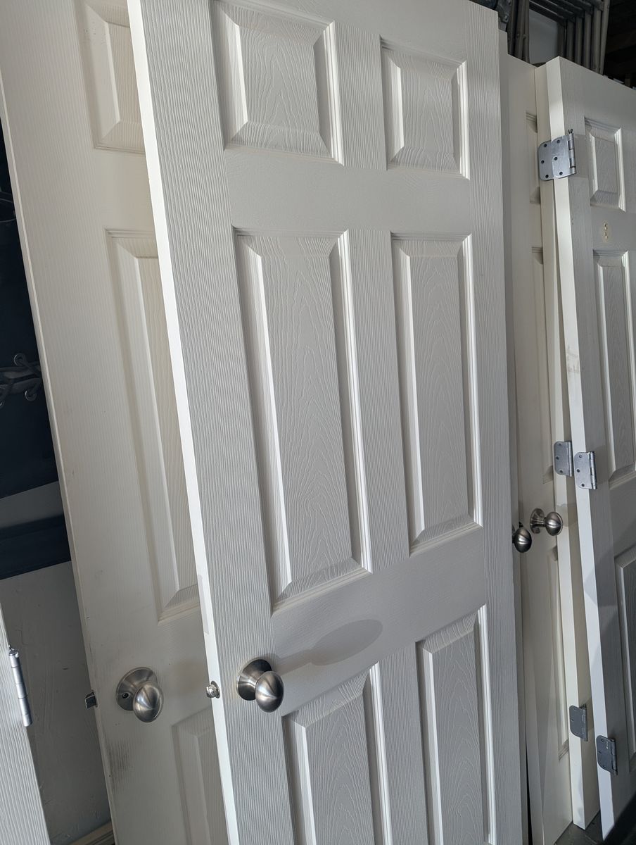 10 doors (traditional 6 panel doors of various sizes)