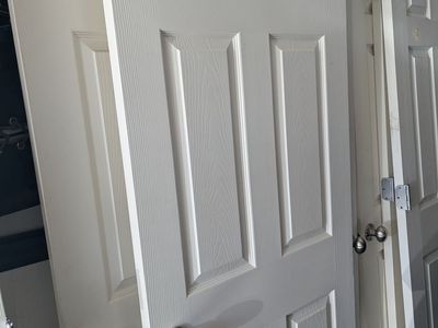 10 doors (traditional 6 panel doors of various sizes)