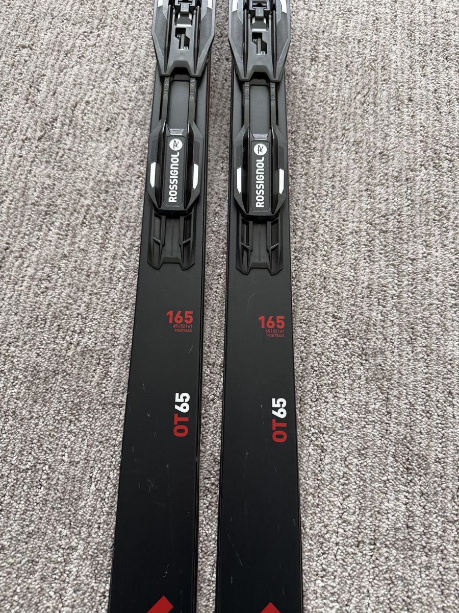 Rossignol cross country skis and poles.  Great condition, 165.