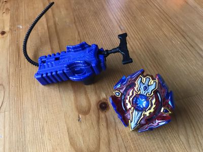 Sieg Xcalibur / Surge Xcalius Burst God Beyblade