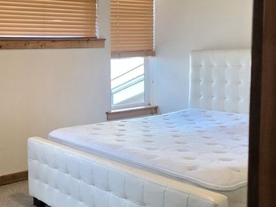 Queen white tufted bed