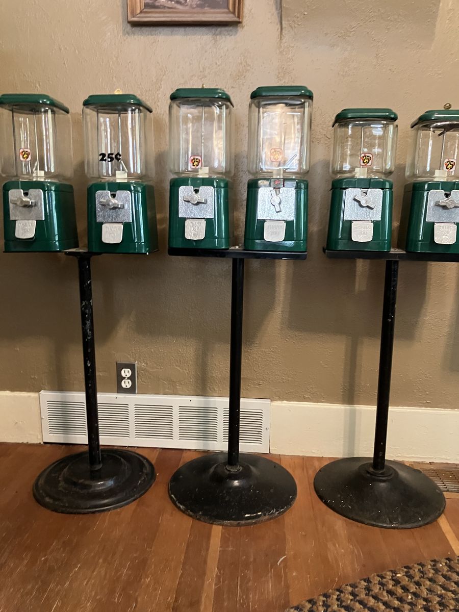 Vintage Oak Manufacturing gum ball vending machines