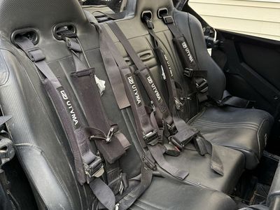 UTVMA 4-Point Harnesses for UTV/Off-Road Vehicles - black and in excellent condition.