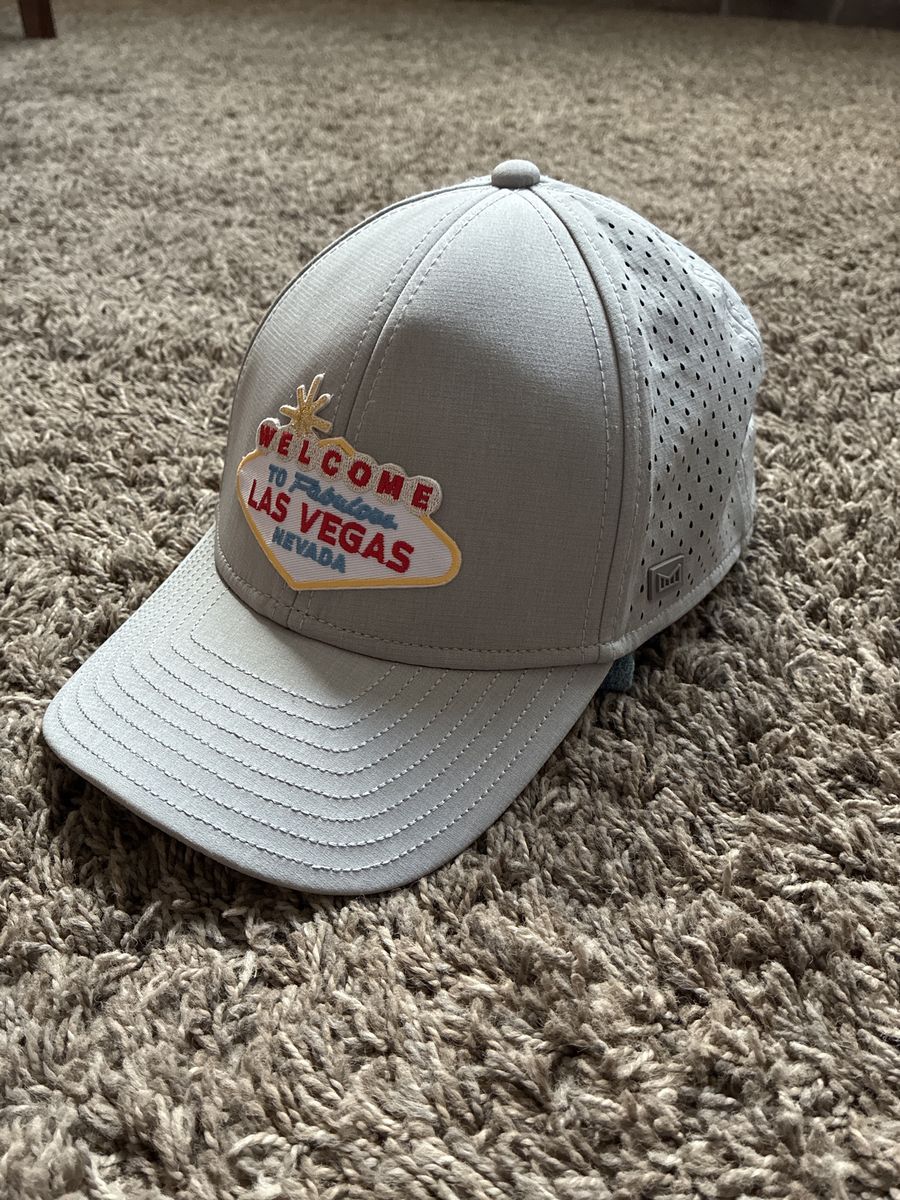 Melin A-Game hydro golf hat medium grey Las Vegas welcome sign adjustable