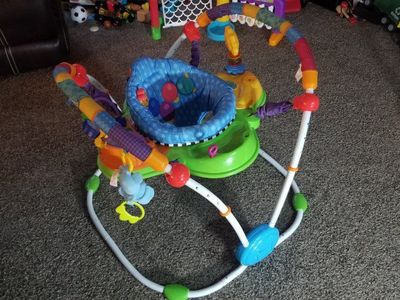 fun little baby jumper and activity center. Gently Used.