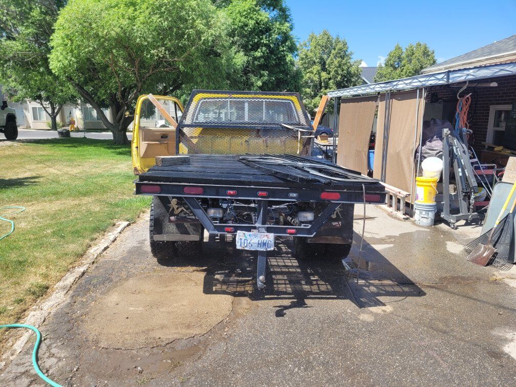1974 one ton 4x4  custom GMC FLAT BED
