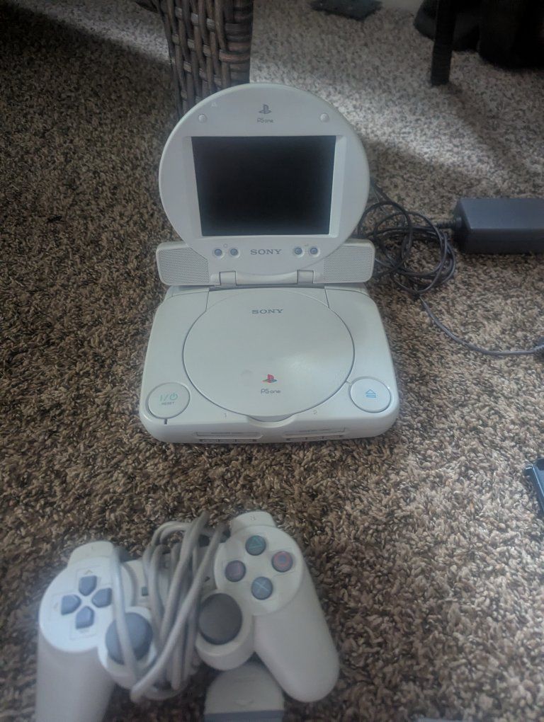 Sony PlayStation 1 Slim + LCD Combo And Games With Memory Card Psx Ps1

Comes with lcd screen, power plug oem controller, memory