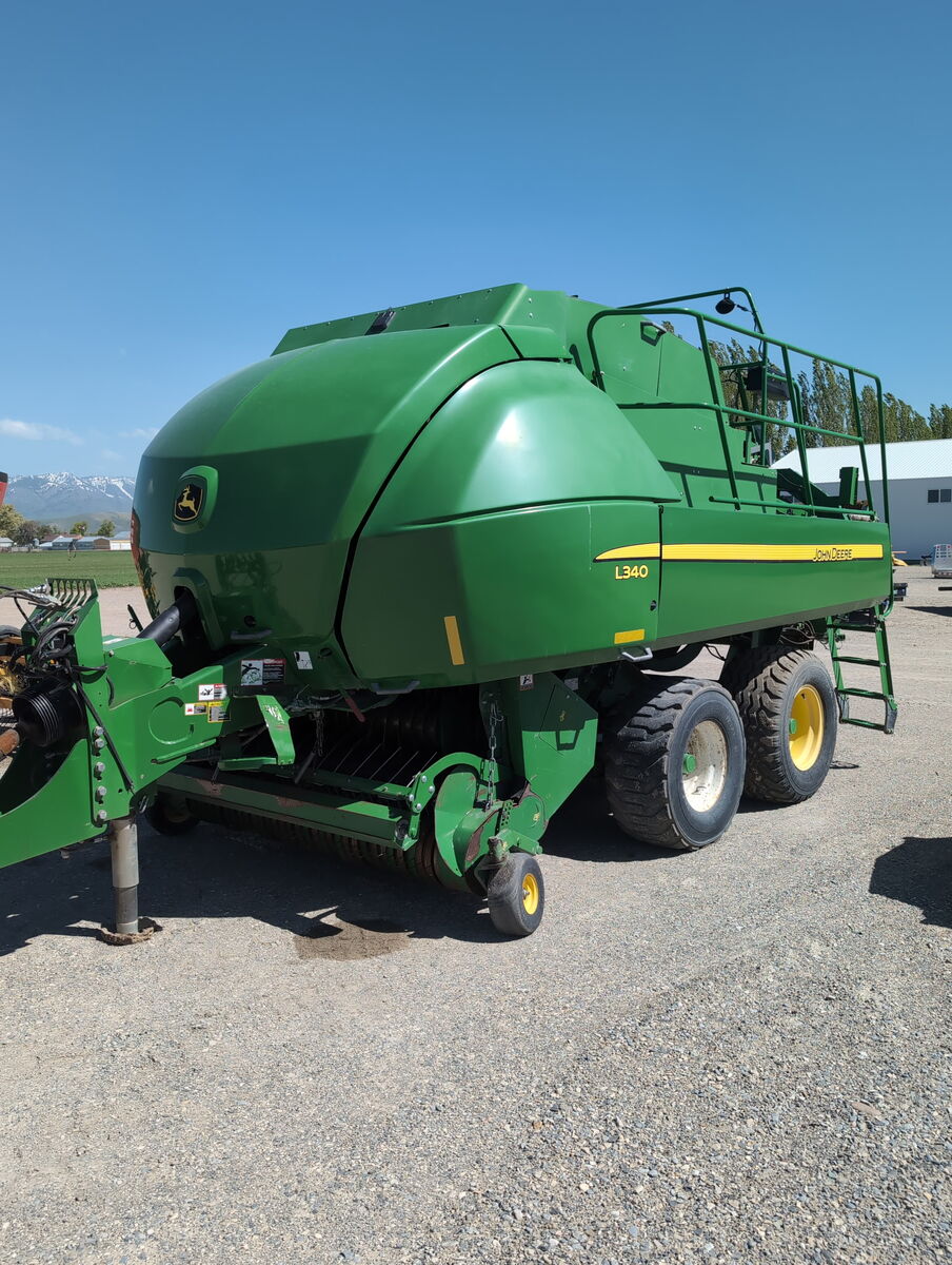 JOHN DEERE L340 BALER 023354