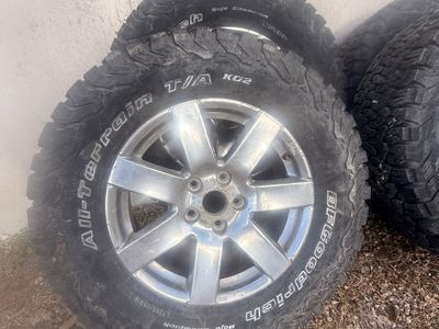 BFGoodrich All-Terrain T/A KO2 LT285/65R18 Tires with Silver Rims - Set of 4