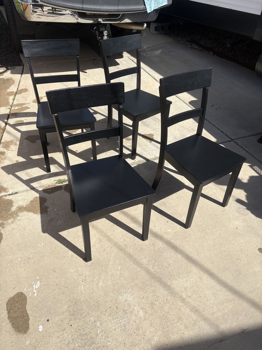 4 black chairs