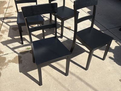 4 black chairs