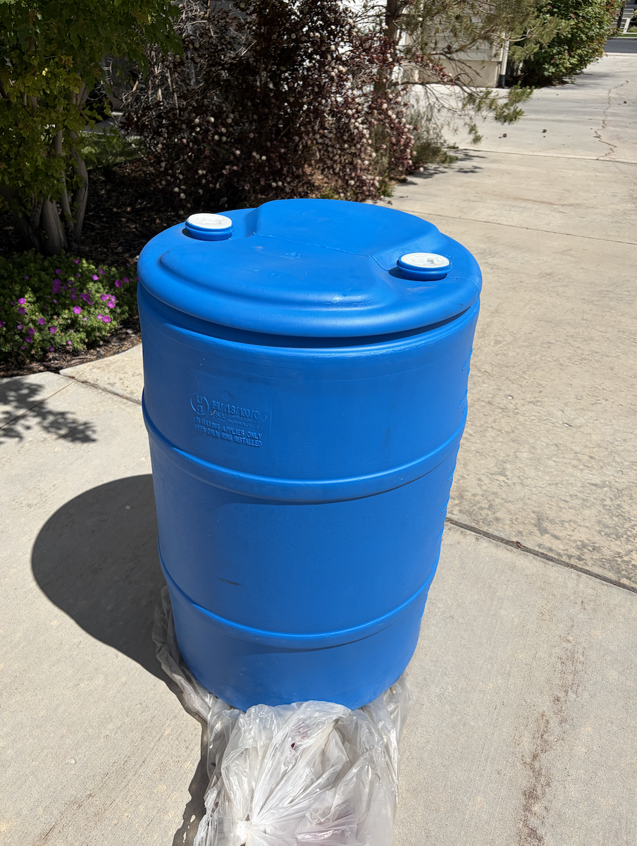 2 Never-Used 55 Gallon Water Storage Barrels – Includes Pump & Bung Wrench