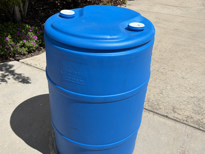 2 Never-Used 55 Gallon Water Storage Barrels – Includes Pump & Bung Wrench