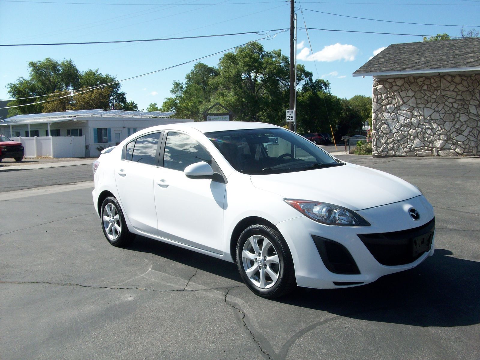 2010 Mazda Mazda3 i Touring — rebuilt & branded title
