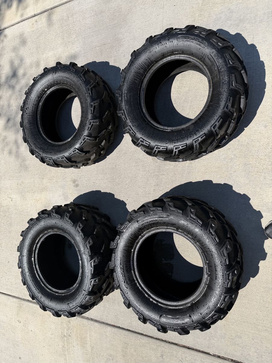 2 26x9.00R12 and 2 26x11R12 Polaris tires
