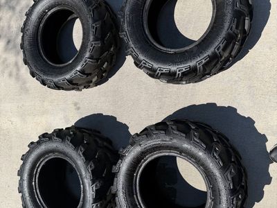 2 26x9.00R12 and 2 26x11R12 Polaris tires