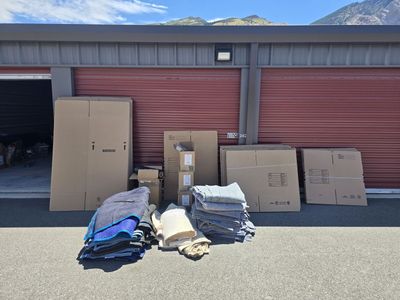 Moving supplies, boxes, blankets, packing paper, stretch wrap and tape