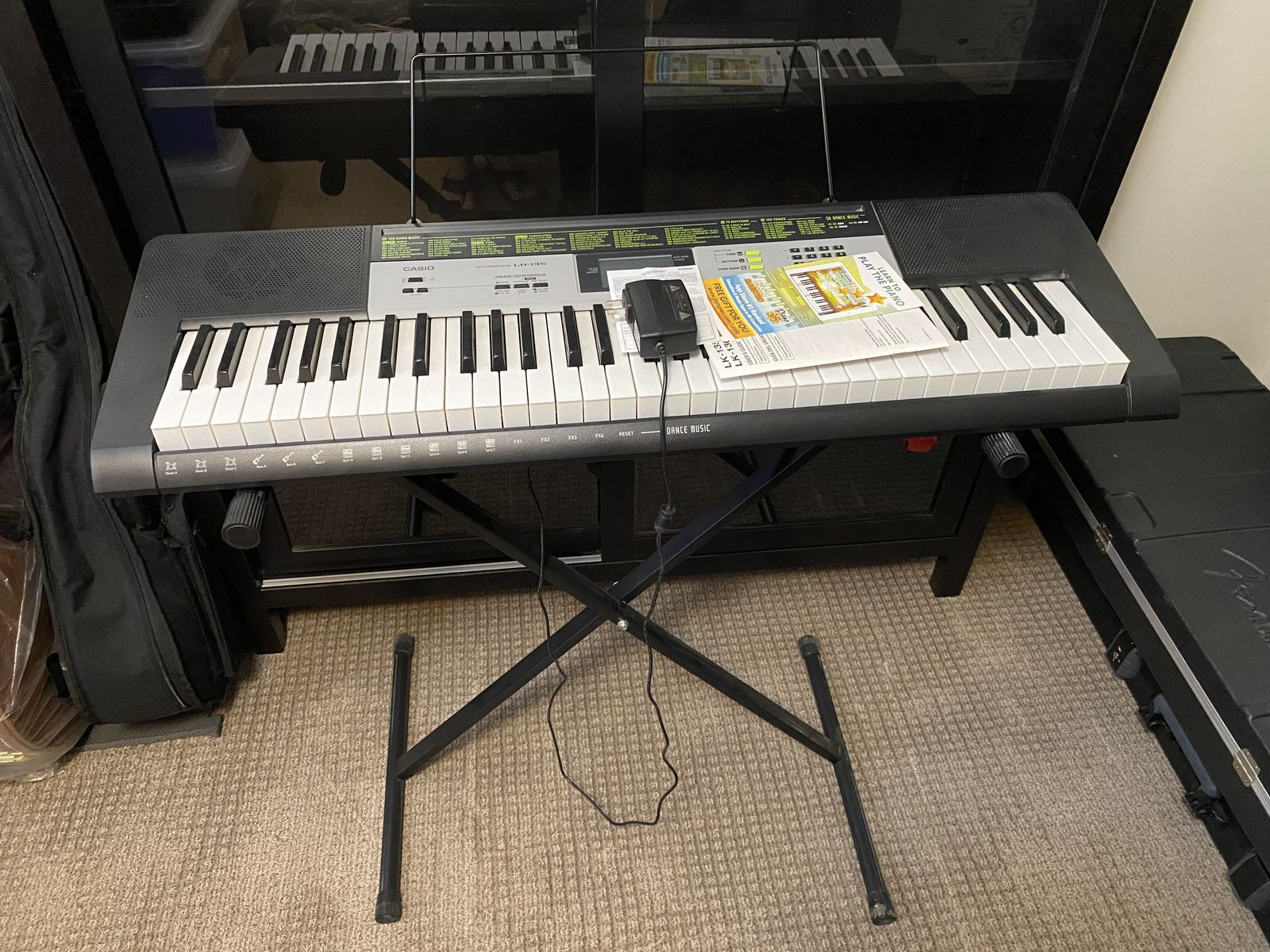 Casio keyboard with stand and power supply