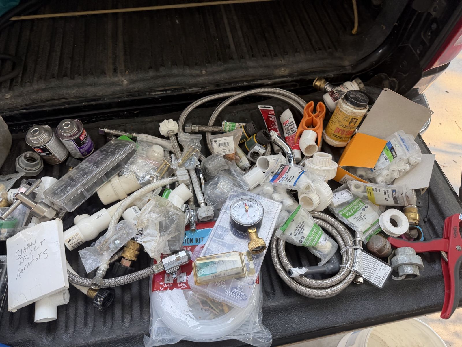 Assorted Plumbing Supplies Lot - Hoses, Brass Valves, PVC Fittings, Pressure Gauge,numerous pex fittings. Cash only