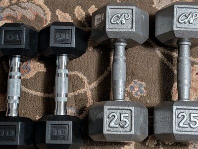 Used workout equipment dumbbells, rebounder