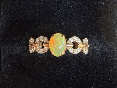 Opal Ring with Accent Diamond Stones