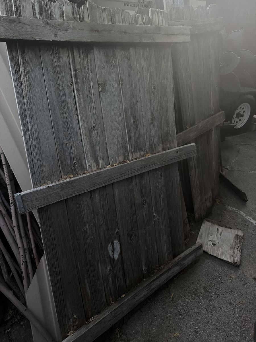 Three reclaimed wood fence panels 6 foot tall
