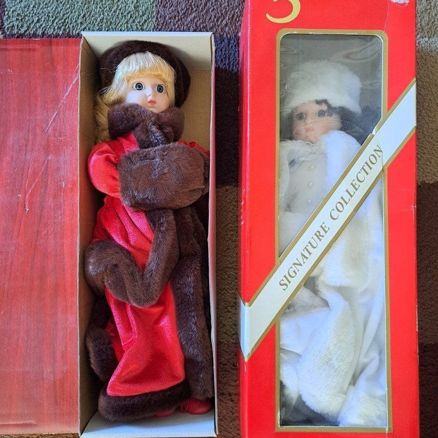 2 old porcelain dolls