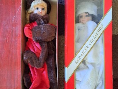 2 old porcelain dolls