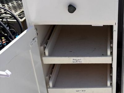 Base cabinet with 3 pull out storage drawers
