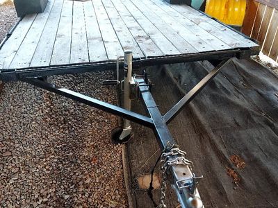 Single-Axle Flatbed Utility Trailer with Wooden Deck and Front Jack