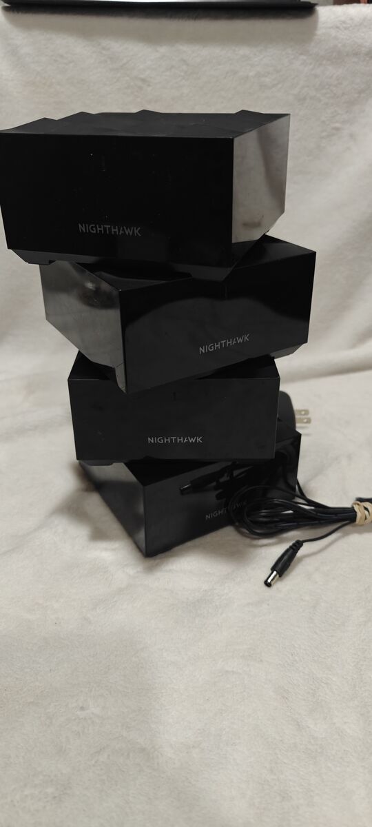 1 Netgear Nighthawk MR60 Router with 3 MS60 Satellite Repeaters. All power supplies included.